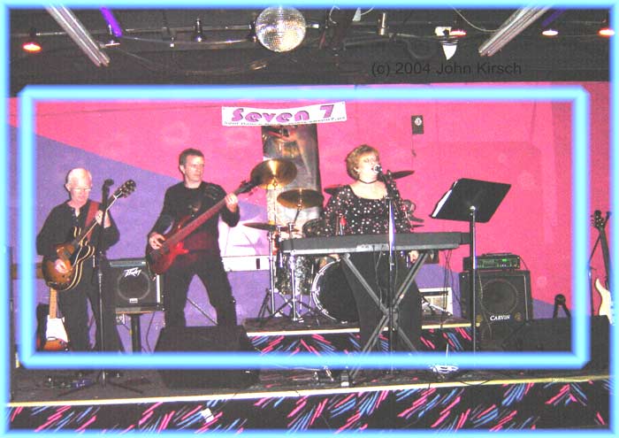 Athens Atlanta Georgia dance cover band Seven 7's musical act is the dance band for weddings, graduation parties, corporate entertainment, in Atlanta, Winder, Athens, North-East Georgia, Gwinnett, Auburn, Dacula, Suwannee, Savannah, Georgia (GA) and all over the South-Eastern United States.  Seven 7 band can open for regional or national touring bands.  Seven 7 Atlanta's dance cover band is a booking agent and agency